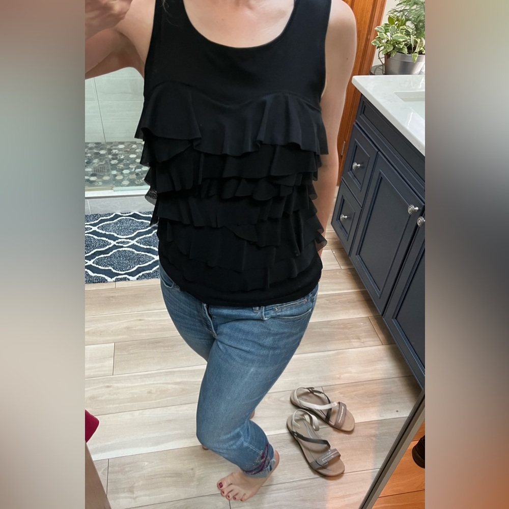 Flirty Black ladies sleeveless top with ruffles